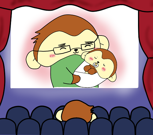 夫と赤ちゃんが映画のスクリーンに映っている